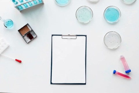 Flat lay lab equipment clipboard