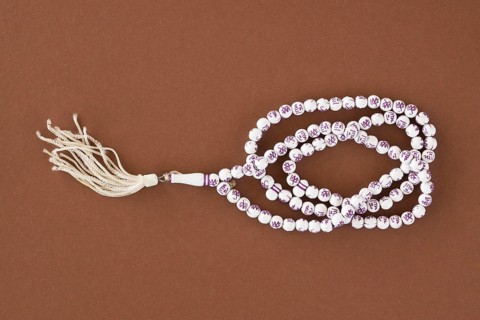Flat lay religious pendant