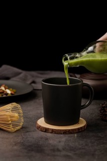 Front view matcha tea poured cup