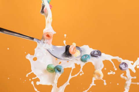 Front view milk cereals splash