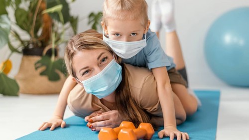 Full shot boy woman wearing masks