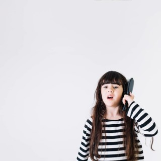 Girl with hairbrush