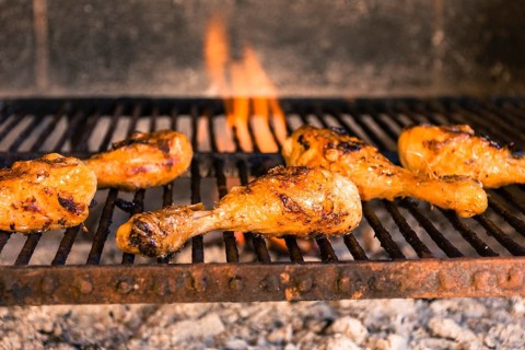 Grilled chicken legs hot grill with heavy fire