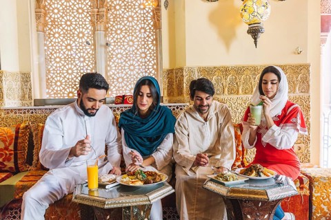 Group young muslim friends restaurant 2
