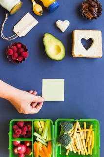 Hand putting sticker table with ingredients