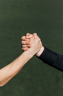 Handshake football field