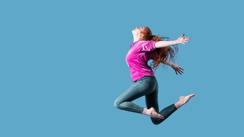 Happy young woman jumping 8