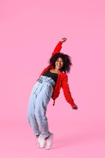 Happy young woman jumping 11