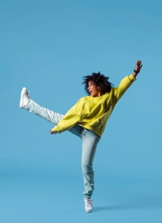 Happy young woman jumping 14
