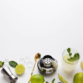 High angle cocktail essentials with lime mint
