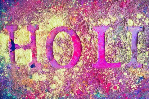 Holi inscription purple table