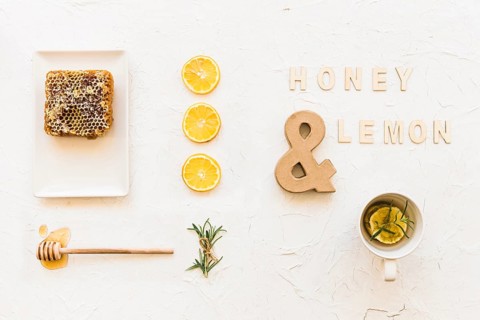Honey lemon tea with honeycomb lemon slices rosemary