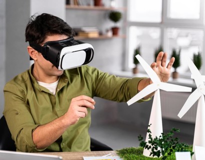 Man working eco friendly wind power project with virtual reality headset