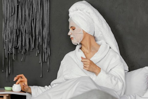 Medium shot woman bed
