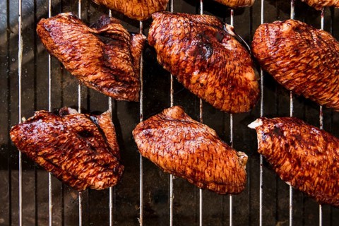 Overhead view delicious pieces chicken meat metal grill
