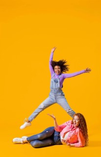 Portrait young women jumping 2