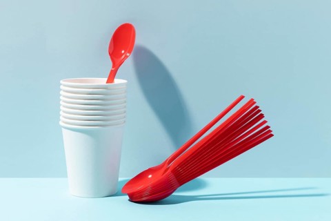 Red small spoons plastic cups