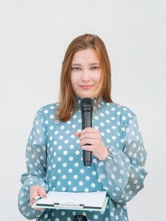 Reporter holding microphone front view