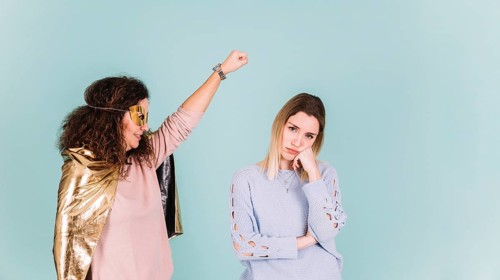 Superhero mother near bored daughter