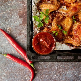 Top view hot chicken wings baking tray