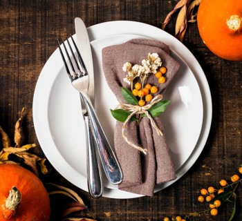 Top view thanksgiving dinner table arrangement with cutlery