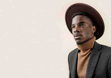Young handsome man posing with hat 6