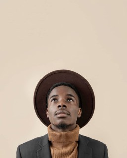 Young handsome man posing with hat 7