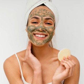 Young woman having homemade mask her face