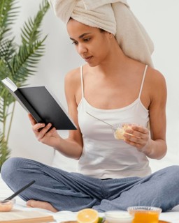 Young woman making natural face mask