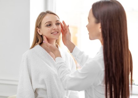 Beautician woman clinic consults client 4