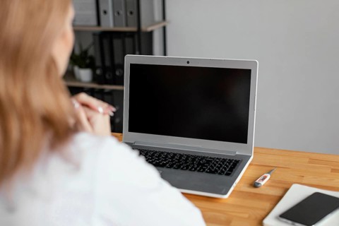 Close up doctor checking patient with laptop