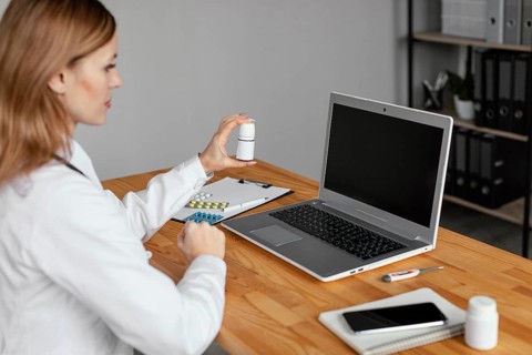 Close up doctor holding medicine