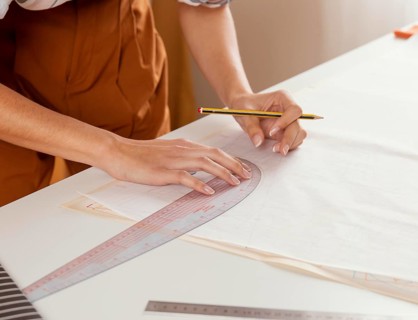 Close up hands with ruler pencil