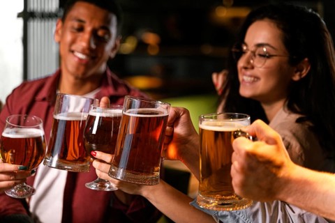 Close up people with beer