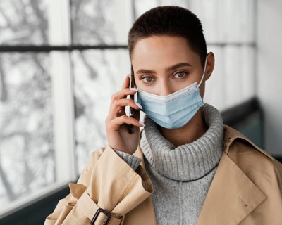 Close up woman wearing face mask