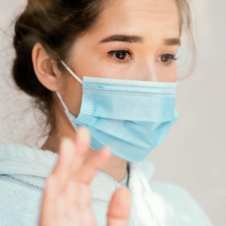 Close up woman wearing face mask 2