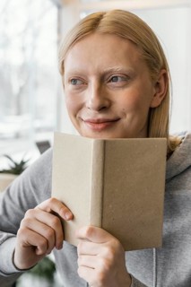 Close up woman with notebook