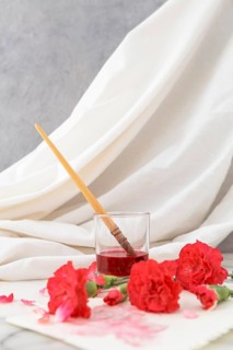 Flowers with glass beside 3