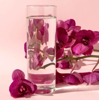 Glass with water flowers