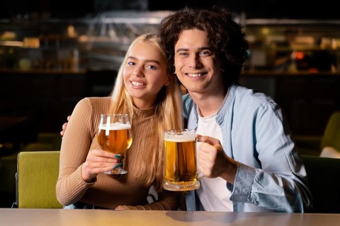 Medium shot man woman pub