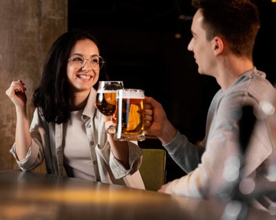 Medium shot people with beer mugs