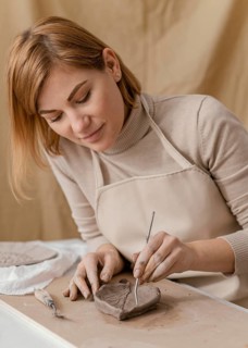 Medium shot woman holding wire