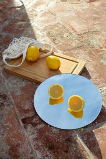 Mirror with fresh lemons