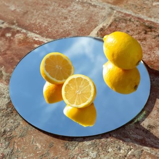 Mirror with fresh lemons 2