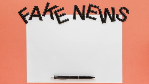 Paper sheet with fake news