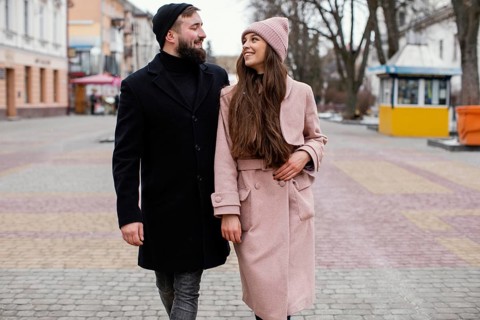 Smiley couple holding hands