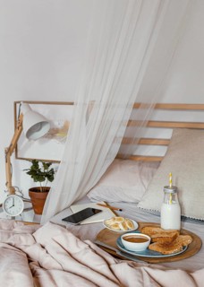 Tasty breakfast bed high angle