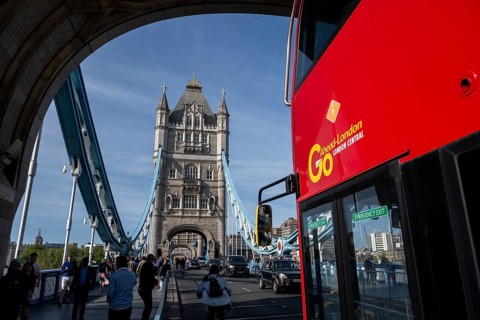 Double-decker crosses Tower Bridge in London