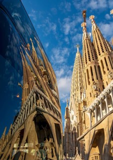 Sagrada Familia reflection in a car window