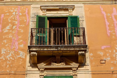 Ochre-coloured house wall